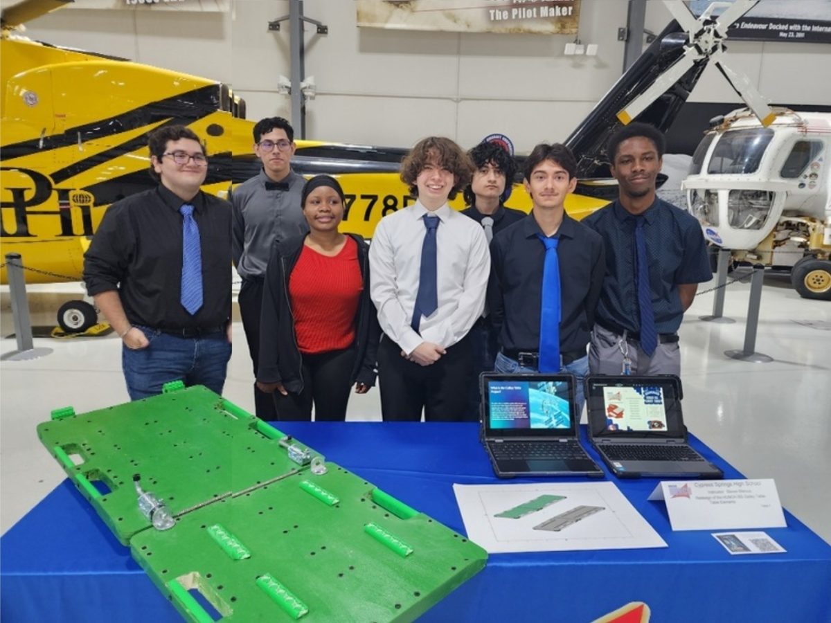 Brett Mantle, Allan Herrera, Iyinoluwa Akanni, Nicolas Duran Sanchez, Dylan Murillo, Miguel Ventura and Bryce Price present their table redesign for NASA HUNCH.
